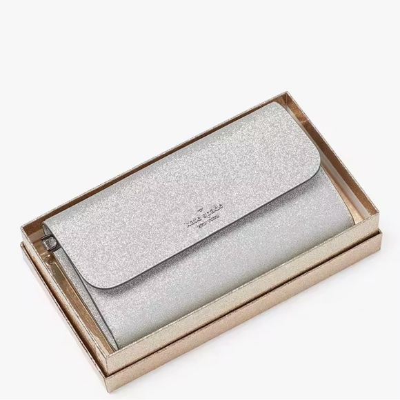 kate spade Handbags - Kate Spade glimmer boxed medium flap wristlet color lunar light silver